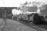 Scene at Birkenhead Woodside station with Fairburn 2-6-4T no 42086 standing in the foreground as a Black 5 takes a train out of the terminus towards Woodside Tunnel. The photograph is thought to have been taken on 3 March 1967.<br>
<br><br>[Robin Barbour Collection (Courtesy Bruce McCartney) 03/03/1967]