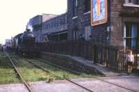 An SLS Railtour stands at the original Edinburgh & Dalkeith Railway terminus at South Leith on 25 August 1962 behind Gresley V2 2-6-2T no 67668. This was the first passenger station in Leith, opened in 1832 as plain 'Leith', with the prefix 'South' being added in 1859. Date of final closure to passengers varies between 1903 and 1905, dependent on source of information and definition of 'last passenger train'. [See image 11374]<br><br>[Frank Spaven Collection (Courtesy David Spaven) 25/08/1962]