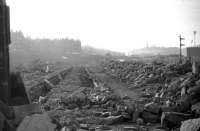 The remains of 64A on the last day of February 1970, seen from the Restalrig Road end of the shed looking towards Waverley. St Margarets signal box is just visible in the centre background, adjacent to the bridge carrying London Road over the ECML. <br>
<br><br>[Bill Jamieson 28/02/1970]