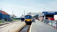 A much diminished Pwllheli terminus, seen in July 1991, with DMU 150 001 at the platform.<br><br>[Colin Miller /07/1991]