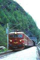 The NSB 10.15 Oslo to Bergen train passes through Orneberget for Mjolfjell Halt in July 1967<br><br>[Colin Miller //1967]