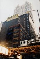 'Midland Hotel' may sound familiar, but perhaps not in this context. The Chicago Elevated Railway (The 'El'), with a train seen crossing in front of the hotel, has been used in several films, including 'The Fugitive' and is the third busiest mass transit system in the USA. The system carried 162 million passengers in 2006. The Central Loop is particularly dramatic.<br><br>[Ken Strachan 14/09/2001]