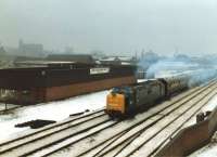 Deltic 55009 <I>Alycidon</I> runs through the Leeds suburb of Armley heading onto the Harrogate line to York, and then on to Hull via Selby, with The Deltic Executive special on a cold and snowy 29 December 1981. The special had reversed at Leeds after arrival from London Kings X, and would return from Hull to Kings X via Doncaster.<br><br>[David Pesterfield 29/12/1981]