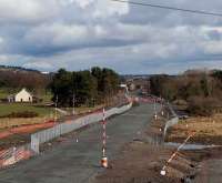 Looking east from the A801 in April 2010 as a new bridge takes shape connecting the Falside and Standhill areas. This area once formed junctions for mines at West Mains, Torbanehill and Whiteside.<br><br>[James Young 04/04/2010]