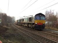 66424+66420 passing through Johnstone with the nuclear flask train from Hunterston to Carlisle on 18 February 2010<br><br>[Graham Morgan 18/02/2010]