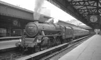 Black 5 no 44794 bides its time with the 5.50pm Dunblane service waiting to leave Glasgow's Buchanan Street station in July 1966.<br><br>[K A Gray 26/07/1966]