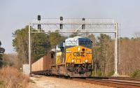 Heading south west out of Maxwell Yard, Greenwood, South Carolina on 23 March 2010 are ES44AH 738 and CW44AC 299. The locomotives are hauling coal empties destined for the CSX yard at Tucker, Georgia.<br><br>[Andy Carr 23/03/2010]