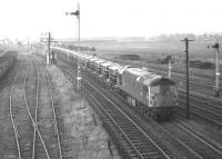 Class 26 no D5311takes the line towards Millerhill at Niddrie West Junction in February 1970 with the 11.40 cement empties from Irvine to Oxwellmains.<br><br>[Bill Jamieson 04/02/1970]
