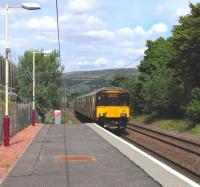 318 258 aproaches West Kilbride on 3 June with a Largs - Glasgow Central service.<br><br>[David Panton 03/06/2010]