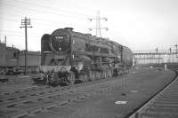 BR Standard class 9F no 92066, one of the batch of powerful 2-10-0s allocated to Tyne Dock shed specifically to handle the gruelling Tyne Dock - Consett iron ore trains. The locomotive is seen on its home shed in March 1961 displaying a 52H shed plate. All 10 of the Tyne Dock 9Fs were fitted with Westinghouse pumps (on the other side of the locomotive) required to operate the pneumatic discharge doors on the iron ore hoppers. [See image 24029]<br><br>[K A Gray 26/03/1961]