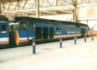 50030 Repulse at the buffer stops following arrival at Waterloo Station on a Network South East service from Exeter late on a Sunday afternoon in March 1991. <br><br>[David Pesterfield 03/03/1991]