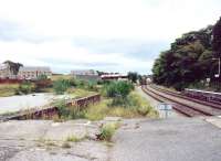 The extensive former goods facilities at Tain, once busy with distillery traffic. View north from the end of the down platform in June 2001. [See image 32140].<br><br>[John Furnevel 16/06/2001]