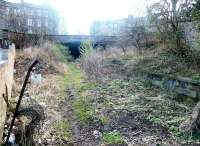 Looking south at the overgrown remains of Heriothill goods and the tunnel under Rodney Street/Broughton Road which originally took the Edinburgh, Leith & Newhaven through to Scotland Street and, ultimately, Canal Street. March 2003. <br><br>[John Furnevel 10/03/2003]