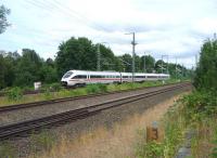 A Berlin bound ICE train at speed on the outskirts of Lubeck  on the morning of July 24th 2010.<br><br>[John Steven 24/07/2010]