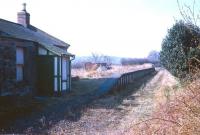 The former station at Nisbet, looking south towards Jedburgh in April 1969. Like the other stations on the Jedburgh branch it had lost its passenger service as long ago as 1948, although the line remained open for freight until 1964 (although some sources quote 1966). The old building is now an attractive converted cottage [see image 20109] <br><br>[Bruce McCartney /04/1969]