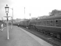 A4 Pacific no 60011 <I>Empire of India</I> hauling a train destined for Glasgow Queen Street arrives at Polmont in May 1960 propelling a failed Swindon InterCity DMU. The bay used by Bo'ness branch services is on the left. <br><br>[Robin Barbour Collection (Courtesy Bruce McCartney) 07/05/1960]