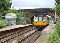 142048 calls at Pleasington station in the leafy suburbs to the <br>
west of Blackburn on 29 July 2010 with a Colne to Blackpool South service.<br>
<br><br>[John McIntyre 29/07/2010]