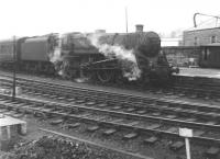 Standard class 5 4-6-0 no 73151 on arrival at Perth with a Dundee - Glasgow train in 1965.<br><br>[Jim Peebles //1965]