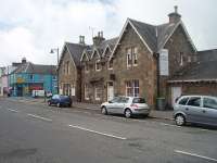 The well preserved station building at Kirkcudbright, looking south along the main street. Behind the building, where the trainshed and platforms were once situated, residential apartments have been built and joined on to the old station, which is currrently used as a fitness studio.<br><br>[Mark Bartlett 19/09/2010]