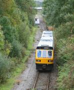The 12.35 Weardale Railway DMU from Stanhope approaches its destination at Bishop Auckland West on 30 September 2010. [See image 30987]<br>
<br><br>[John Furnevel 30/09/2010]