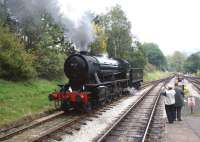 Ex-WD 2-8-0 no 90733 runs round its train at Oxenhope on 9 October <br>
2010.<br>
<br><br>[John McIntyre 09/10/2010]