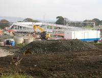 View east over the new station at Armadale on 12 October 2010 showing work underway on access roads, parking etc on the north side of the site. Part of the town of Bathgate can be seen in the left background.<br><br>[John Furnevel 12/10/2010]