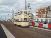 Restored Sheffield tram 513 is on long term loan to the Blackpool system from Beamish and is used with other preserved trams in ordinary service on busy days and special events. It was the last four wheeled design built in the UK but only lasted eight years in service before the Sheffield tram system closed in 1960. 513 is seen here running through the new platforms at Cabin.<br><br>[Mark Bartlett 16/10/2010]