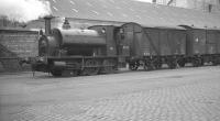 Memories of Merseyside. Mersey Docks & Harbour Board 0-6-0ST no 26 moving a rake of wagons within Liverpool Docks in April 1962. This locomotive [Avonside 1810 of 1918] is currently in store on the Ribble Steam Railway awaiting restoration.<br><br>[K A Gray 14/04/1962]