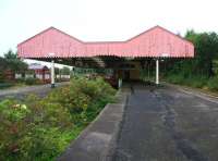 The overgrown central bay platform at Oldham Mumps station on 28 September 2009. The station was closed completely the following month due to the conversion of the line to Metrolink. It had been demolished by May 2010. The station canopy was bought by the East Lancashire Railway who hope to erect it at Bury Bolton Street station.<br>
<br>
<br><br>[Ian Dinmore 28/09/2009]