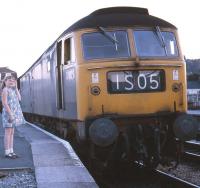Brush Type 4 no D1928 stands at Newton Abbot on 30 July 1969 ready to depart with the 2050 hrs Motorail service to Edinburgh.<br>
<br><br>[John McIntyre 30/07/1969]