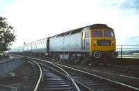 Smart looking class 47 no 1108 with white embellishments to the buffers and wheel rims (possibly from previous Royal Train duty), comes off the north end of the Royal Border Bridge in September 1970 before running through Berwick station at the head of the 08.40 Leeds - Edinburgh express. <br><br>[Bill Jamieson 12/09/1970]