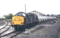 37 272 on the curve at Liskeard in July 1985 with a train of clayhoods from Moorswater. <br><br>[Ian Dinmore /07/1985]
