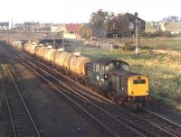 Final picture of the day as the light starts to fade on a pleasant October afternoon in 1970. Clayton D8580 passes Niddrie North Junction at 16.39 with trip E13 from Leith South destined for Millerhill yard. <br>
<br><br>[Bill Jamieson 13/10/1970]