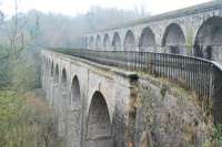 Chirk Aquaduct (left) on the Llangollen branch of the Shropshire Union Canal was later paralleled by Chirk Viaduct (right) of the Shrewsbury Oswestry and Chester Junction Railway. The view looks south.<br><br>[Ewan Crawford 21/02/2011]