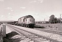 37074 with a northbound freight passing the site of the former Oakle Street Station (closed 1964) on the Gloucester to Newportline on 26 September 1987. <br><br>[Peter Todd 26/09/1987]