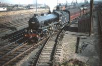 B1 no 61343 brings coaching stock destined for Waverley out of Craigentinny carriage sidings on 30 September 1959. Seen in the background, just above the B1's tender, is the tunnel inspection train [see image 27043].<br><br>[A Snapper (Courtesy Bruce McCartney) 30/09/1959]