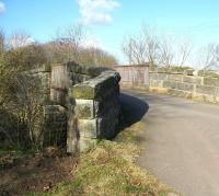 The slightly mis-shapen 137 year old road bridge still spanning the trackbed just north of the site of Roslin station on 28 February 2011. [See image 37223] <br><br>[John Furnevel 28/02/2011]