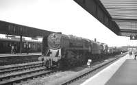 A lengthy up freight rumbles south through Doncaster station on the centre road in July 1963 behind BR Standard class 9F 2-10-0 no 92172.<br><br>[K A Gray 20/07/1963]