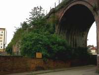 The viaduct on the right, between Foregate Street and Malvern, is familiar enough; but by peering through the foliage on the left, you may discern a lower level. This is the current end of the former Racecourse branch, where racehorses were sometimes delivered one van at a time. At least the accountants knew who the primary user was. The branch closed in 1964; the racecourse survives.<br><br>[Ken Strachan 31/05/2010]