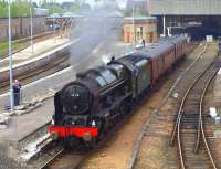 46115 <i>Scots Guardsman</i> leaving Perth with support coaches on 20 April 2011.<br><br>[Brian Forbes 20/04/2011]