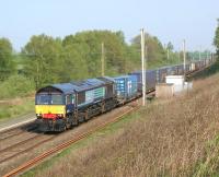 DRS intermodal service 4M34 from Coatbridge to Daventry heading south past the hot axle box detector (HABD) at Coppull Hall on the <br>
WCML near Standish on 22 April 2011.<br>
<br><br>[John McIntyre 22/04/2011]