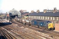 Class 37 No. 6755 brings a colliery trip workingsouth through Stockton station, heading towards Tees Yard,late in the afternoon of 2nd October 1970.<br>
<br><br>[Bill Jamieson 02/10/1970]