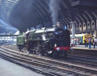 BR Standard class 9F 2-10-0 no 92220 <I>'Evening Star'</I> waits on the down centre road in York station on 4 July 1976 prior to taking over the NELPG's 'Scarborough Spa Flyer', which it will work to the seaside resort and back. <br>
<br><br>[Bill Jamieson 04/07/1976]