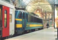 SNCB electric locomotive no 2110 stands at the buffers at Antwerp Central on 4 June 2004, shortly after arrival with the 20.57 train from Brussels.<br><br>[Bill Roberton 04/06/2004]
