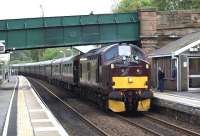 <I>The Royal Scotsman</I> runs through Polmont station on 6 May 2011 en route to Wemyss Bay. WCRC 37685 is at the head of the train with 57001 bringing up the rear.<br><br>[Brian Forbes 06/05/2011]