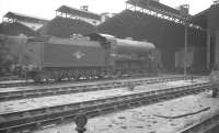 Maunsell 'Schools' class 4-4-0 no 30902 <I>Wellington</I> stands in the shed yard at 70A Nine Elms in August 1961.<br><br>[K A Gray 21/08/1961]