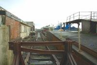 Looking from the end of the headshunt from Stranraer Harbour platform 2 in March 2006 towards the Station. A run-round loop was still in situ there but the loop for platform 1 had been disconnected. The only pedestrian access to platform 2 at this stage was by picking a way round the end of the tracks, the footbridge having been removed. [See image 27142] <br>
<br><br>[Colin Miller 27/03/2006]