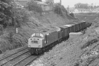 Scene on the 'sub' in 1974 as 40160 coasts downhill towards the site of Newington Station with a mixed freight for Millerhill. In the right background new houses now occupy the former goods yard.<br>
<br><br>[Bill Roberton //1974]