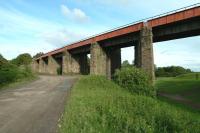 The western end of the long viaduct that spanned the Monkland Canal at Calder, between Whifflet and Airdrie, seen here in June 2011. The line, which closed in 1990, latterly served the Imperial Tube Works. <br><br>[John Steven 10/06/2011]