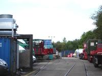Photograph taken in July 2011 showing the entrance lines from Network Rail into the former Procor, later Bombardier, railway works at Horbury Junction, Wakefield. The picture shows the later arrangement of three access tracks to cope with the volume of Virgin Mk 2 and then GNER Mk 4 stock refurbished here prior to closure by Bombardier.<br><br>[David Pesterfield 06/07/2011]